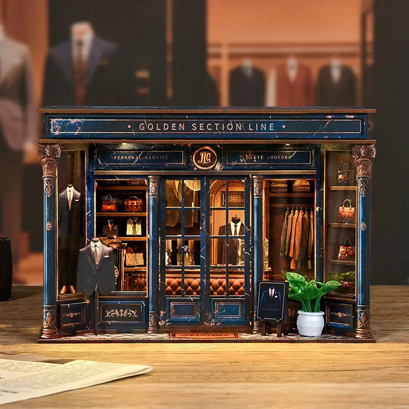 【Golden Section Line】 Haute couture menswear store wooden miniature model finished display | Dark blue marble texture frame with gold carved pillars, warm yellow light through the glass window | Minipata