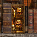 【Antique Book Collection Room】 book nook placed between vintage hardcover books (like Tour Eiffel), wooden frame and carved hollow-out design blending perfectly with the book spines, looking like a miniature library on the shelf
