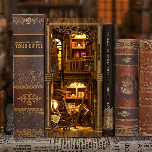 【Antique Book Collection Room】 book nook placed between vintage hardcover books (like Tour Eiffel), wooden frame and carved hollow-out design blending perfectly with the book spines, looking like a miniature library on the shelf
