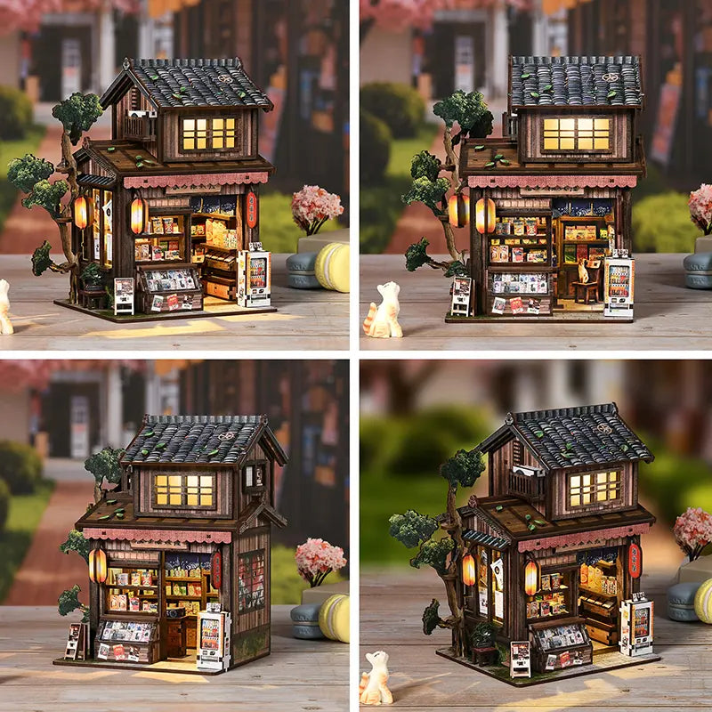 【Kasuga Grocery Store】 DIY miniature model fully assembled, showing front two-story pitched roof, dark gray tile texture, openable sliding doors with lattice windows, and red lanterns on lintel