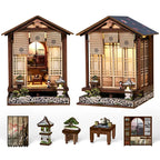 【Moss-Lantern Harmony Garden】 DIY miniature house fully assembled, showing herringbone roof, dark brown wood grain eaves, openable shoji door, and bamboo blind with family crest on lintel