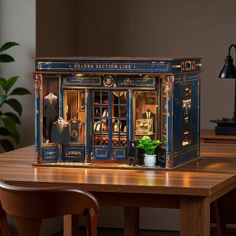 【Golden Section Line】 Real scene on wooden desk display: dark blue and gold haute couture miniature storefront, paired with surrounding plants and desk lamp, serving as a cozy desktop decoration
