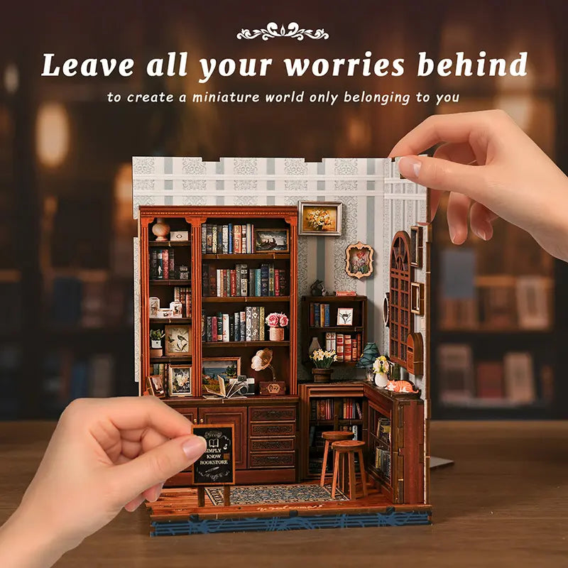 【Pergola Reading Room】 Interior full view with side panel opened: wall-to-wall wooden bookshelves filled with miniature books, paired with vintage camera, gramophone, and illustration decorations; hands placing the chalkboard sign on the table, creating your own miniature reading world

