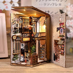 The Alley Waiting for the Cat book nook wooden gift box packaging alongside assembled product – laser-engraved maneki-neko logo, Japanese alley miniature book nook diy kit gift set
