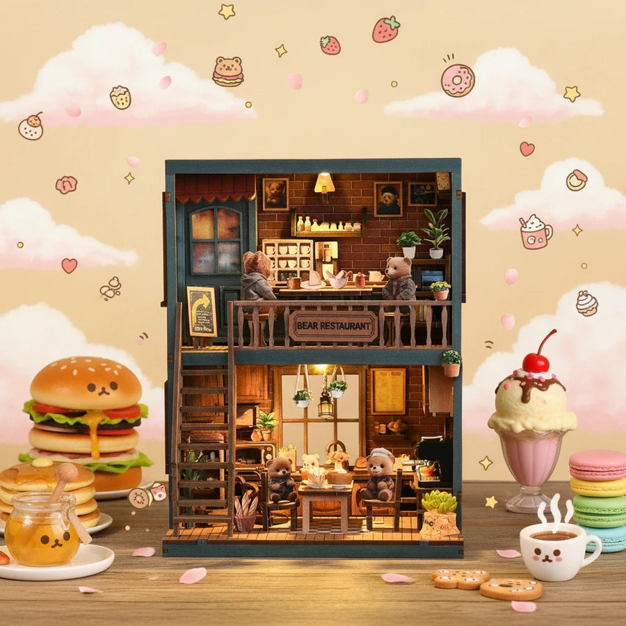 Bear Restaurant DIY miniature house feature display – two-story blue-framed miniature bear café surrounded by oversized desserts and sweets, warm amber LED interior lighting, bear figurines on both floors, cozy handcrafted wooden café scene
